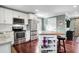 Bright kitchen featuring stainless steel appliances, white cabinets, and a butcher block island at 1328 Erckmann Dr, Mount Pleasant, SC 29464