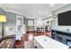 Open concept space with living room connecting to kitchen area featuring wood floors at 1328 Erckmann Dr, Mount Pleasant, SC 29464