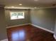 Spacious living room with hardwood floors, recessed lighting, large window, and neutral paint at 1328 Erckmann Dr, Mount Pleasant, SC 29464