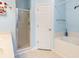 Bright bathroom with walk-in shower and large tub at 144 Cinnamon Rd, Summerville, SC 29483