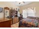 Cozy bedroom with wood floors, a ceiling fan and large dresser at 144 Cinnamon Rd, Summerville, SC 29483