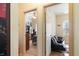 Hallway shot shows entry to a bedroom and to a den with natural lighting at 144 Cinnamon Rd, Summerville, SC 29483