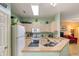 Efficient kitchen featuring neutral countertops, white appliances and ample cabinet space at 144 Cinnamon Rd, Summerville, SC 29483