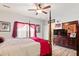 Spacious bedroom with ceiling fan, hardwood floors, and tv at 144 Cinnamon Rd, Summerville, SC 29483