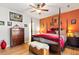 Spacious bedroom with hardwood floors, canopy bed and decorative accents at 144 Cinnamon Rd, Summerville, SC 29483