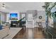 Elegant living room featuring a fireplace, TV, piano, and staircase with plenty of space at 1556 Cranes Nest Rd, Mount Pleasant, SC 29466