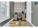 Home office with a wooden desk, chair, and natural light from window at 1556 Cranes Nest Rd, Mount Pleasant, SC 29466