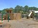 Community playground with a wooden ship structure, slides, and swings at 1556 Cranes Nest Rd, Mount Pleasant, SC 29466