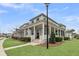 Spacious front porch featuring ceiling fans and ample room for outdoor seating, perfect for relaxing at 1556 Cranes Nest Rd, Mount Pleasant, SC 29466
