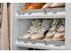 Organized shoe shelves inside walk-in closet at 1556 Cranes Nest Rd, Mount Pleasant, SC 29466