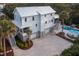 Beautiful home with a pool and large driveway amid mature trees in a coastal neighborhood at 1648 Home Farm Rd, Mount Pleasant, SC 29464