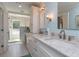 Spacious bathroom featuring double sinks, vanity, and a luxurious glass-enclosed shower that streams in plenty of natural light at 1648 Home Farm Rd, Mount Pleasant, SC 29464