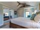 Comfortable bedroom featuring a bed with blue and white bedding, with additional sleeping spaces and scenic views at 1648 Home Farm Rd, Mount Pleasant, SC 29464