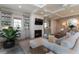 Spacious living room with fireplace, coffered ceiling, and stylish decor at 1648 Home Farm Rd, Mount Pleasant, SC 29464