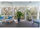 Relaxing covered porch with outdoor seating offering great scenery at 1648 Home Farm Rd, Mount Pleasant, SC 29464