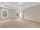 Bright bedroom with recessed lighting and tan carpet features two windows for natural light at 2085 Terrabrook Ln, Charleston, SC 29412