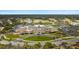 Beautiful aerial view of country club with golf course, landscaping, and parking at 2119 Landfall Way, Seabrook Island, SC 29455
