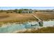 Aerial view of beautiful marshland home with private dock along tranquil waterway at 2119 Landfall Way, Seabrook Island, SC 29455