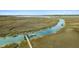 Scenic aerial view of a waterway and marsh with a dock leading to the water at 2119 Landfall Way, Seabrook Island, SC 29455
