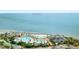 Breathtaking aerial view featuring beautiful pools, beach access, and lush landscaping by the ocean at 2119 Landfall Way, Seabrook Island, SC 29455