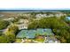 Community tennis courts surrounded by lush trees and beautiful landscaping at 2119 Landfall Way, Seabrook Island, SC 29455