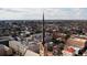 Scenic aerial view of Charleston featuring a church steeple and cityscape with residential and commercial areas at 214 Calhoun St # 5, Charleston, SC 29401