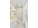 Bright bathroom featuring a shower-tub combo and neutral tile flooring at 214 Calhoun St # 5, Charleston, SC 29401