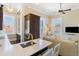 Open-concept kitchen featuring a marble island and stainless steel appliances at 214 Calhoun St # 5, Charleston, SC 29401