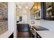 Well-lit kitchen features white countertops, stainless appliances, and hardwood floors at 214 Calhoun St # 5, Charleston, SC 29401