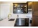 This kitchen features stainless steel appliances and dark wood cabinets at 214 Calhoun St # 5, Charleston, SC 29401