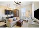 Cozy living area featuring modern furniture, a well-equipped kitchenette, and warm, inviting decor at 214 Calhoun St # 5, Charleston, SC 29401