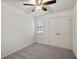 Bedroom with plush gray carpeting, closet, and window at 2362 Parsonage Rd # 17G, Charleston, SC 29414