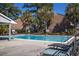 Community pool is surrounded by lounge seating at 2362 Parsonage Rd # 17G, Charleston, SC 29414