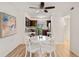 Dining area with white table and chairs adjacent to the kitchen at 2362 Parsonage Rd # 17G, Charleston, SC 29414