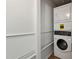 White stacked washer and dryer appliances are ready for use at 2362 Parsonage Rd # 17G, Charleston, SC 29414