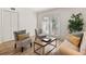 Living room with neutral tones, wood floors, and a coffee table at 2362 Parsonage Rd # 17G, Charleston, SC 29414