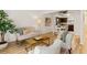 Bright living room features modern decor, light wood floors, and an open floor plan at 2362 Parsonage Rd # 17G, Charleston, SC 29414