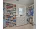 Spacious closet with custom built-in shelving, drawers, and hanging rods offers ample storage at 2506 Gatewood St, Charleston, SC 29492