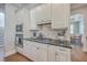 Kitchen cabinets featuring granite countertops, a gas range, and modern appliances at 2506 Gatewood St, Charleston, SC 29492
