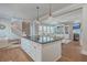 Open concept kitchen and living area with a large center island and views of the living space at 2506 Gatewood St, Charleston, SC 29492