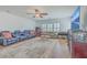 Large living room with hardwood floors, area rug, comfortable seating, and a TV, perfect for gatherings at 2506 Gatewood St, Charleston, SC 29492