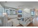Bright living room featuring a fireplace, built-in shelves, and comfortable seating at 2506 Gatewood St, Charleston, SC 29492