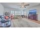 Spacious living room with ample seating, area rug, hardwood floors, and a wall-mounted TV for entertainment at 2506 Gatewood St, Charleston, SC 29492