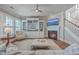 Comfortable living room with a fireplace, built-in shelving, and large windows for natural light at 2506 Gatewood St, Charleston, SC 29492