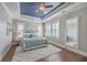 Elegant bedroom with hardwood floors, trey ceilings, and plantation shutters at 2506 Gatewood St, Charleston, SC 29492