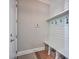 Inviting mudroom with shiplap walls, built-in bench, and convenient storage baskets at 2506 Gatewood St, Charleston, SC 29492