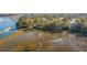 Beautiful aerial shot of the home showcasing its waterfront location and natural surroundings at 26 Saturday Rd, Mount Pleasant, SC 29464