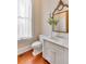 Elegant bathroom featuring a marble countertop vanity and natural lighting at 26 Saturday Rd, Mount Pleasant, SC 29464