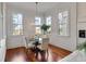 Charming dining area filled with natural light, featuring hardwood floors and classic decor at 26 Saturday Rd, Mount Pleasant, SC 29464