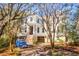 Beautiful traditional-style home with meticulous landscaping, brick stairs, and a welcoming entrance at 26 Saturday Rd, Mount Pleasant, SC 29464